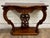 This is a gorgeous vintage carved mahogany serpentine console table, hall table, or entryway table with elements of...