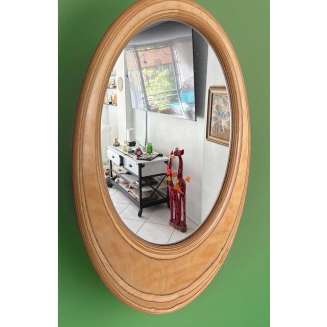 This vintage Organic Modern laminated hardwood mirror by W. Schwab is a striking and highly collectible design piece from...