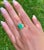 Natural 4.60 carat Colombian emerald and diamond unisex ring. The center stone is 4-prong set with the "perfect" color...