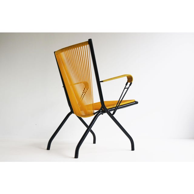 Rare French design 1950 Foldable lounge chair. Designed by Andre Monpoix for Meubles TV. The combination of black metal...