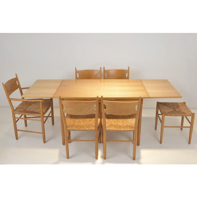 Ash wood Designer: Unknown Year: around 1960 Manufacturer: Unknown Country: Germany Measurements: H 73 cm W 118/158/198 cm...