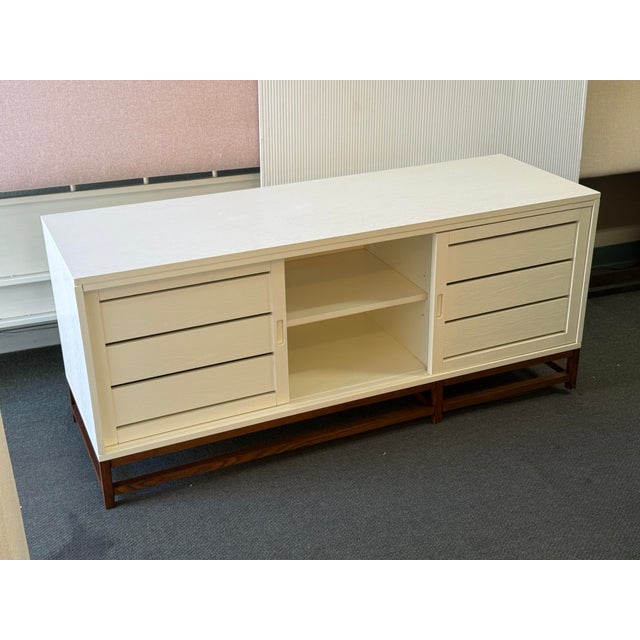 Design Plus Gallery presents the Clapboard Media Console from Crate & Barrel. Modern farmhouse style cleans up with crisp,...