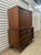 This two-piece "gentleman's chest" or armoire from Young Manufacturing is known for its distinctive concave (curved) front...
