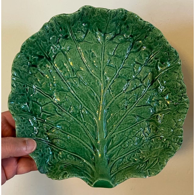 Antique Portuguese majolica pottery green glazed cabbage or lettuce leaf serving dish. Naturalistically molded with...