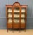 An attractive Edwardian period display cabinet. Made in England but in the French style. Very well constructed in walnut...
