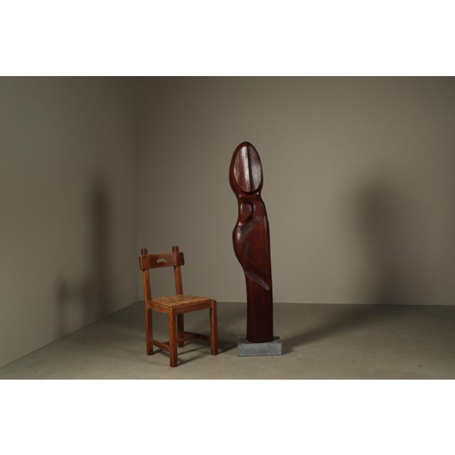 This powerful vertical work embodies the sculptural language of Begga d'Haese, whose practice is defined by restrained...