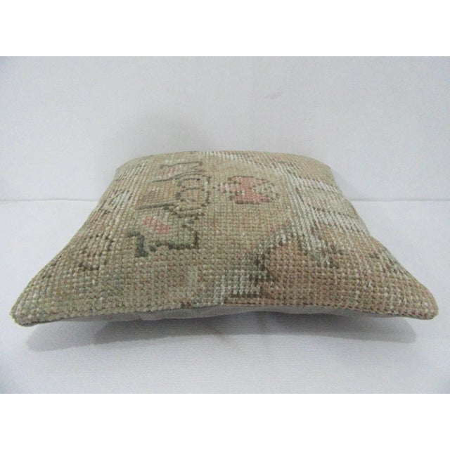 Decorative pillow cover made from a vintage Turkish handknotted rug. Backed with good quality cotton fabric. Pillow...