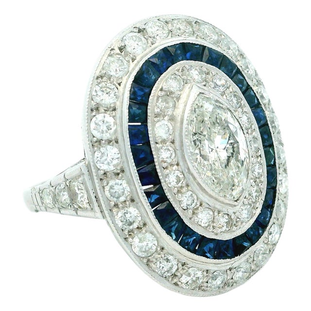 Art Deco Platinum Diamond and Calibré Sapphire Navette Ring, Circa 1920, Size 6 For Sale