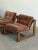 W34 D37 H32 SW28 SD22 SH20 These handcrafted lounge chairs anchored by a bold architectural solid oak base with rounded...