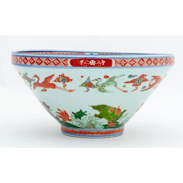 Chinese Wucai Porcelain Bowl, the exterior hand-enameled with cranes and turtles, the interior with central medallion of a...