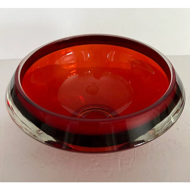 Beautiful ruby colored red glass bowl. Modern form and design. Overall width is 8" - actual opening of bowl is 6". Unmarked.