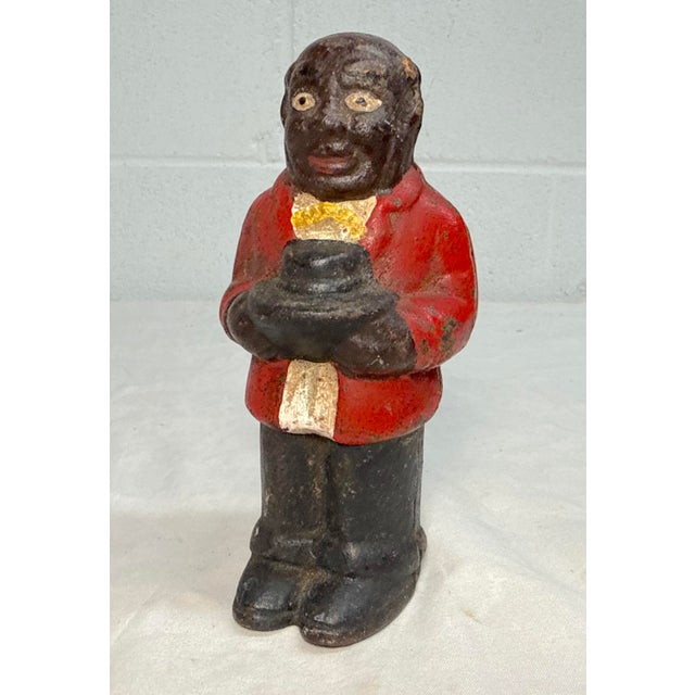 Up for sale is an antique original early 1900's Uncle Moses cast iron still bank. This unique collectible features a...