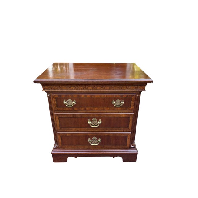 Georgian Style Mahogany Banded Wood Three-Drawer Nightstand This single nightstand is an impressive collection of inlay...