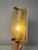 This wall lamp by Orrefors is an exquisite example of Swedish glass art from the mid-century era. The design captivates...