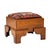 Antique 1920s handcrafted solid oak footstool featuring a thick, architectural frame with chamfered edges, stepped legs,...