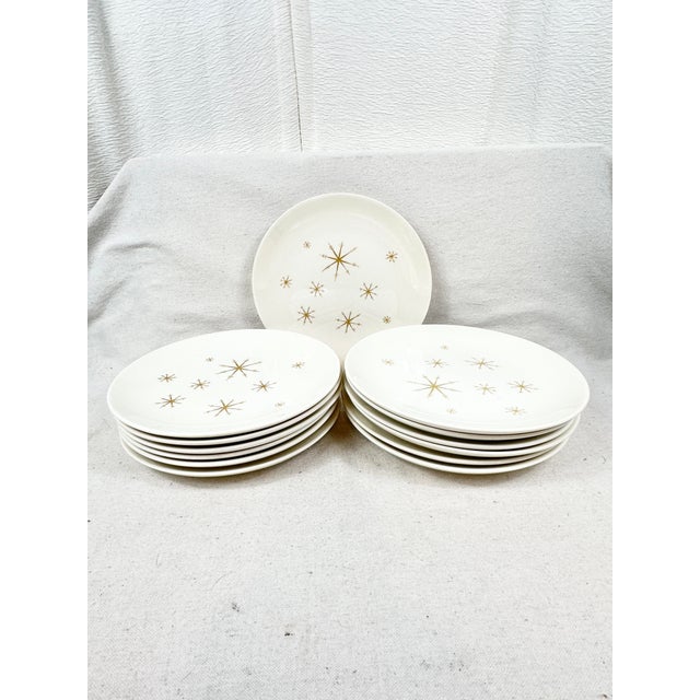 Fun vintage mcm set of dinner plates. Made by Royal China. Part of their Star Glow design. Set includes 13 dinner plates....