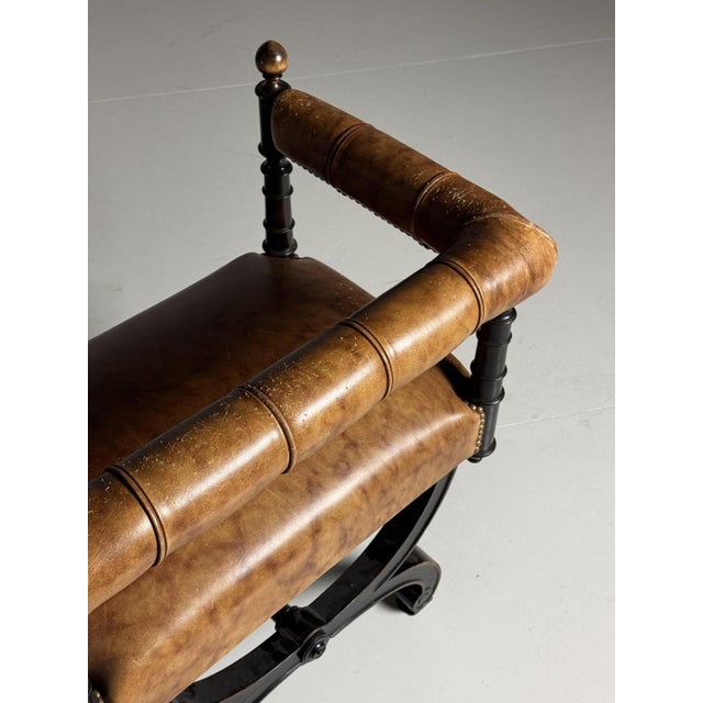 Early 20th century stool/chair. Ebonized frame, with beautiful patina. Upholstered in sheep/goat leather. Dimensions: 66W...