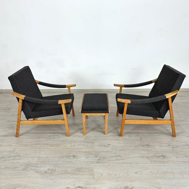 Dimensions: H 31” x W 25.5” x D 28.5” x SH 16” Ottoman: H 16.5” x W 24.5” x D 14.7” Pair of Vintage lounge armchairs with...