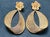Introducing our exquisite Vintage 21 Karat Yellow Gold Dangling Earrings, a true statement piece adorned with diamonds....