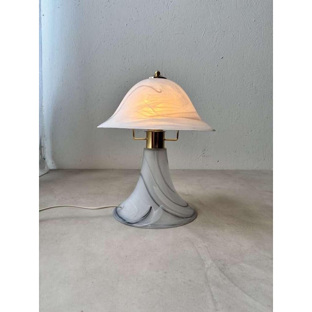 Atmospheric table lamp in an organic mushroom shape, manufactured in the 1970s by the Italian lighting company Artistica...