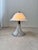 Atmospheric table lamp in an organic mushroom shape, manufactured in the 1970s by the Italian lighting company Artistica...