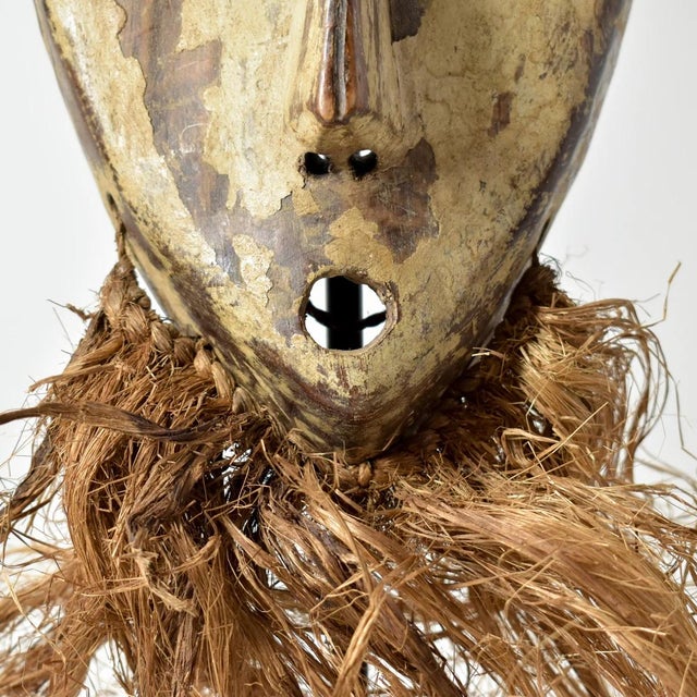 The Lega bearded mask originated from the Lualaba River near Lake Tanganyika in the Democratic Republic of the Congo. This...