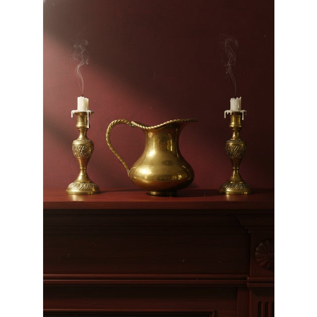 This high-end solid brass pitcher by Hosley International is an exceptional example of mid-century artisan metalwork from...