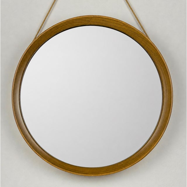 Mid-century wall mirror made in Italy in the 1960s. Wood, decorative vinyl. The vintage mirror is in very good vintage...