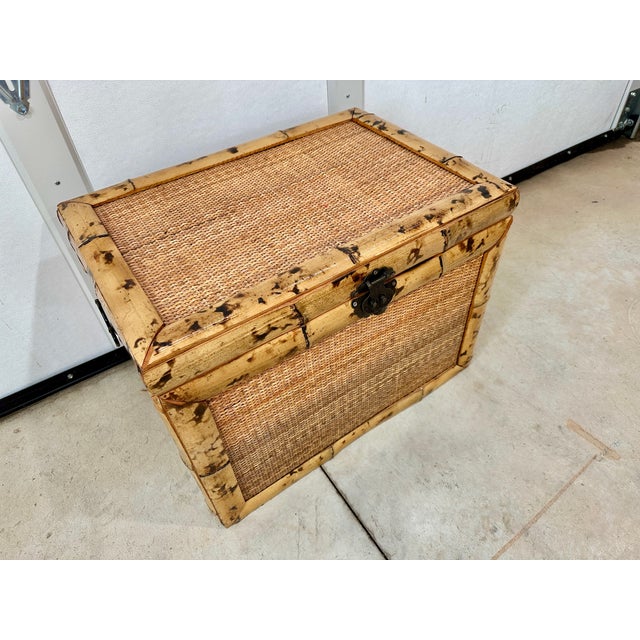 Vintage burnt tortoise bamboo and cane trunk with engraved Asian latch.