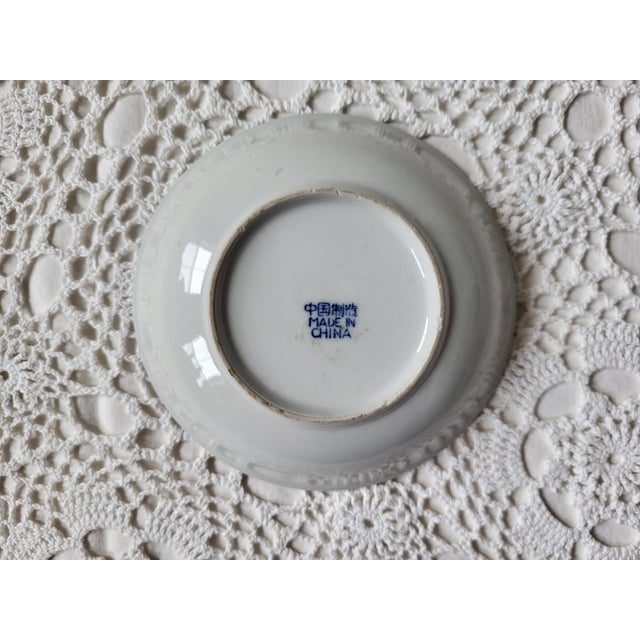 A mid century blue & white rice bowl measuring 5 ¾” diameter x 1 ½” h. Perfect to mix and match in a traditional, boho or...