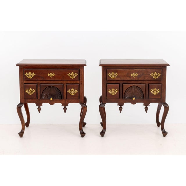 Pair of Queen Anne Style Mahogany Lowboys, each long drawer above three drawers with brass pulls and central carved shell...