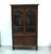 Antique bookcase, display cabinet, with two glass doors at the top and two doors at the bottom. Three adjustable shelves...