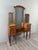 Elegant and large Louis XVI style wooden dressing table with a triptych mirror. It features a large central mirror...