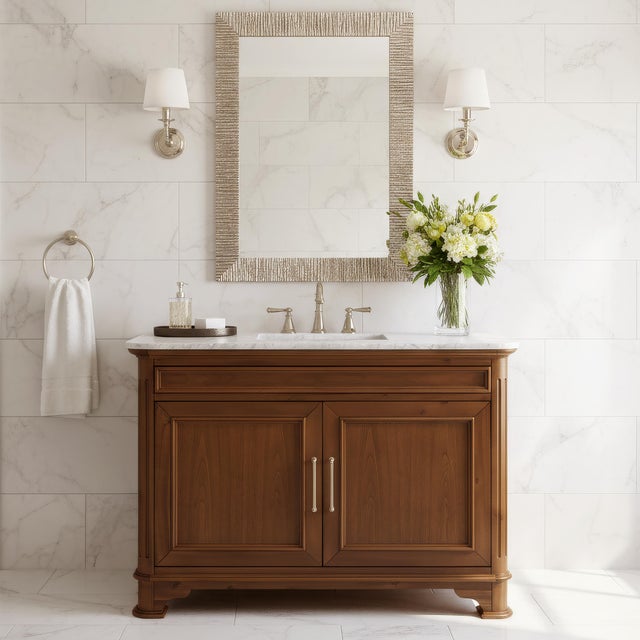 Bring timeless elegance and functional luxury to your bath with the Butler Specialty Company Colorado Wood & Marble Single...