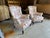 Elevate your space with this magnificent, matching pair of 19th-century French antique Napoleon III club chairs....