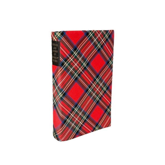 A gorgeous, vintage copy of Poems and Songs of Robert Burns. Features a red, silk tartan cover. Retains the original...