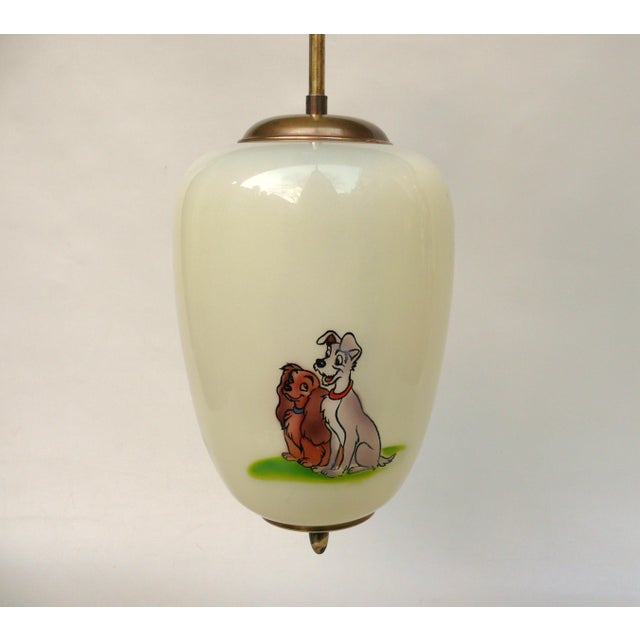 A rare ceiling light by doria, made in the 1950s, featuring three walt disney characters: lady, the tramp, and jock. the...