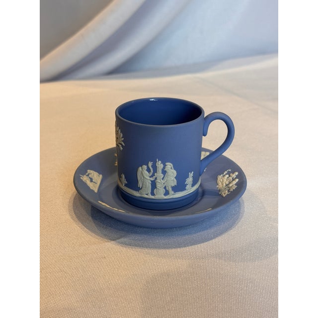 A beautiful demitasse and saucer set in the vintage Wedgwood Jasperware iconic pale blue and white colorway, dating to...