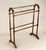 A very nice quilt or blanket rack Made of hard wood, most likely oak, ash or walnut Turned side supports and five dowel...