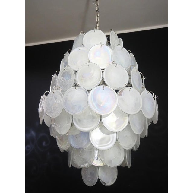Vintage Italian Murano chandelier in Vistosi style. The chandelier has 87 fantastic white alabaster iridescent glasses in...