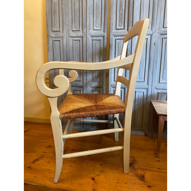 This is a stunning country farmhouse armchair from France, dating from the Biedermeier period around 1880. It is very...