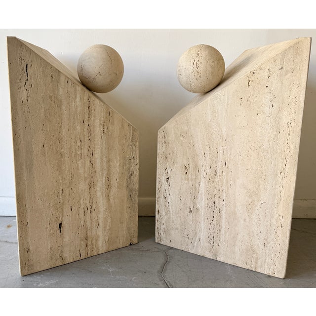 Stunning pair of Italian travertine bases from 80's. Perfect for dining table, console table or side tables. They are...