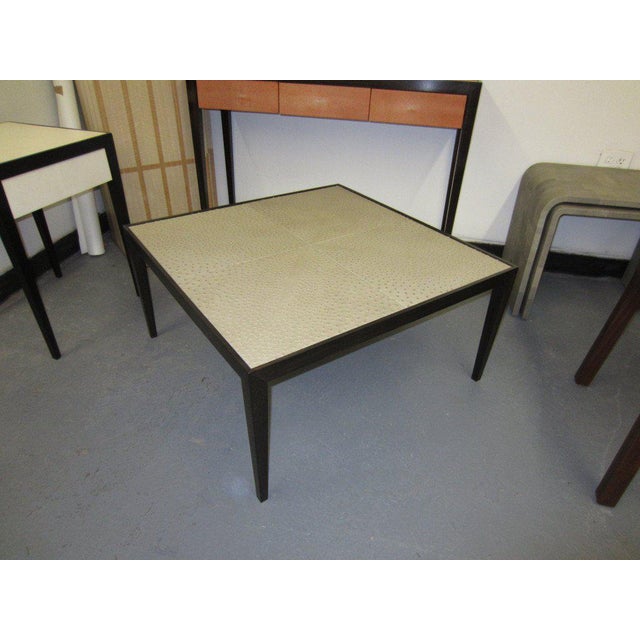 Bespoke Ebonized ostrich-top coffee table.