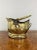 Antique Victorian quality brass helmet coal scuttle having a shaped carrying handle with a shaped quality brass helmet...