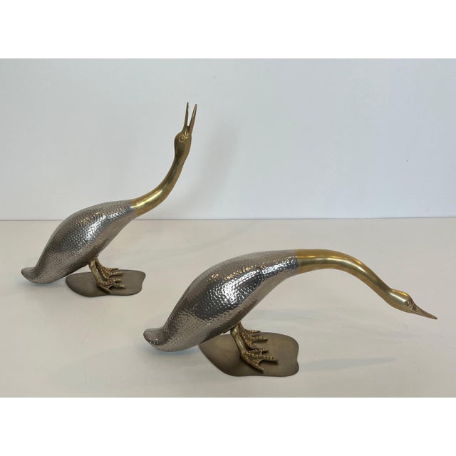 This beautiful set of two ducks is made of silver and brass. It is a French piece. Circa 1970
