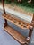 Great piece, with a carved crest, turned columns and two tiers of scrolling coat hooks. The lower rack has openings for up...