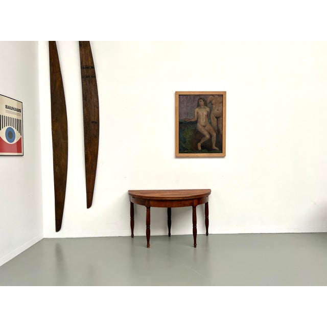 Maison Lecan presents this sleek console table on one side, a charming dining table on the other: with a simple movement,...