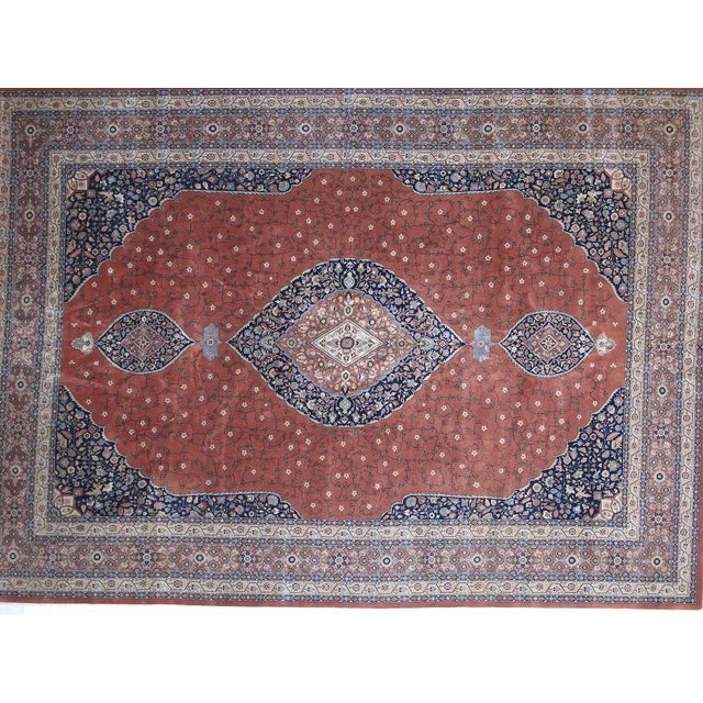 This master piece is an exceptionally fine wool pile Persian Tabriz Hajijalily Style carpet hand woven in India by master...