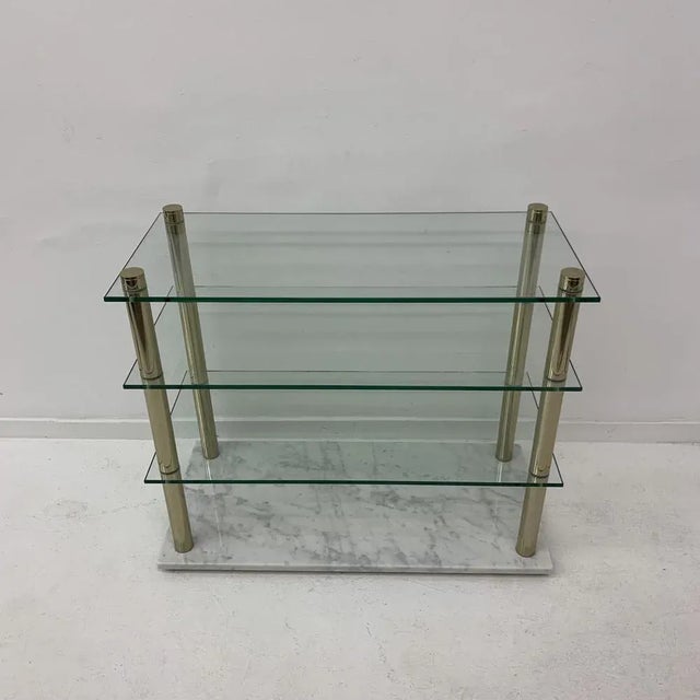 Dimensions: 83cm W, 71cm H, 38cm D Condition: Glass has a chip. See photos. Material: Metal, Glass, Marble
