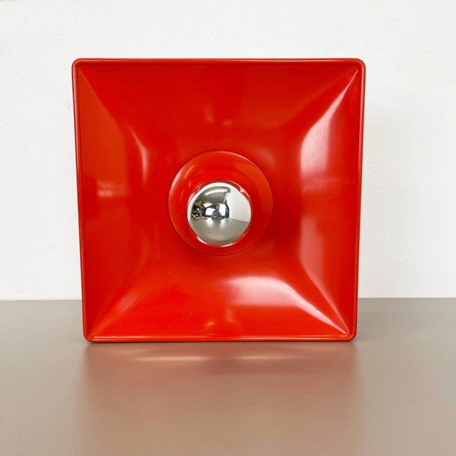 Wall light Producer: Sölken Lights, Germany Origin: Germany Age: 1970s An original red-orange wall light designed and...